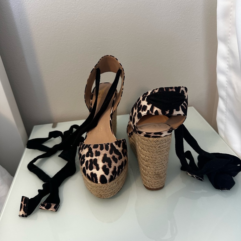 JLo cheetah print lace up wedges. Size 6.